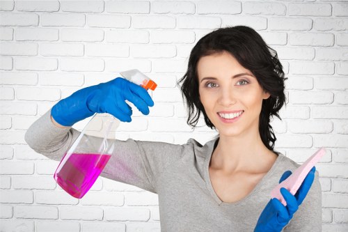 Professional cleaning team working in a kitchen