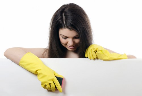 Technicians performing steam cleaning on a luxury rug