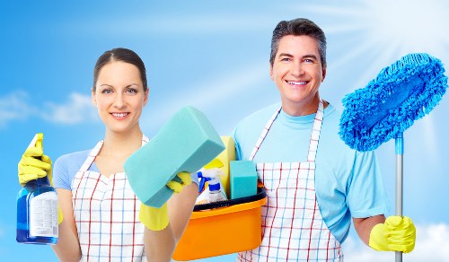 Eco-friendly cleaning solutions being applied to a patio